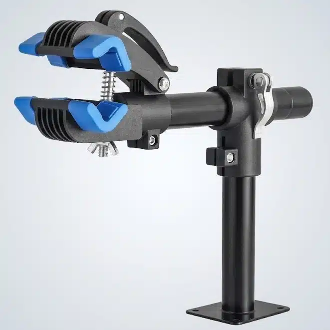 A black and blue adjustable bike repair stand clamp with a sturdy base, spring mechanism, and padded jaws for holding a bicycle frame securely.