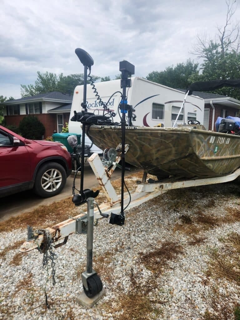 First Mate XT clamped to the bow of a 1995 Lowe Roughneck jon boat on its trailer, alongside a Minn Kota Terrova trolling motor